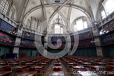 Interior of the Octagon Library at Queen Mary, University of London in Mile End, East London, with colourful leather bound books Editorial Stock Photo