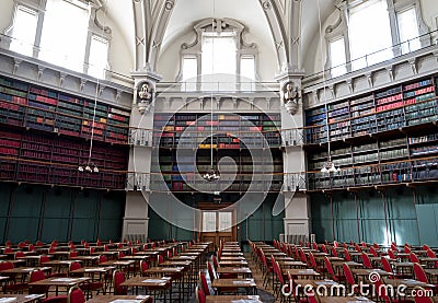 Interior of the Octagon Library at Queen Mary, University of London in Mile End, East London, with colourful leather bound books Editorial Stock Photo