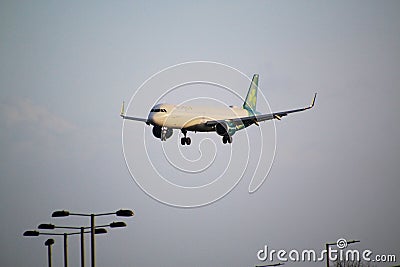 A view of an Aeroplane coming into land at London's Heathrow Airport Editorial Stock Photo