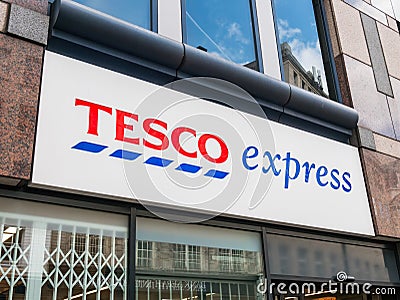 :Tesco Express sign logo and facade, London, UK. Editorial Stock Photo