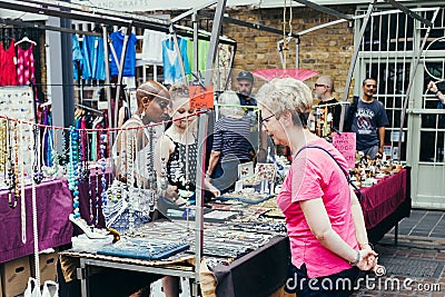 Woman looking at a handmade jewellery on sale Editorial Stock Photo