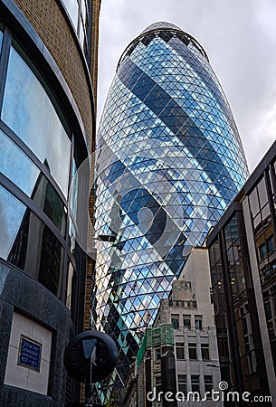 Looking up at the Gherkin building in the City of London, UK Editorial Stock Photo