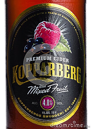 LONDON, UK - MARCH 10, 2018 : Cold Bottle label of Kopparberg premium cider with mixed fruit flavor on white. Editorial Stock Photo