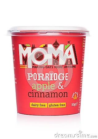 LONDON, UK - MARCH 05, 2019: Cup of Moma Porridge with apple and cinnamon and gluten free on white Editorial Stock Photo