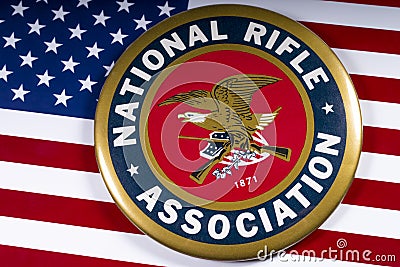 National Rifle Association Logo and the US Flag Editorial Stock Photo
