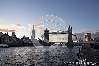 London cityscape across the River Thames with a view of Tower Bridge and the Shard seen from boat trip Editorial Stock Photo