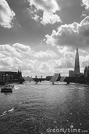 Silhouette of London cityscape across the River Thames with a view of the shard, London, England, UK, Editorial Stock Photo