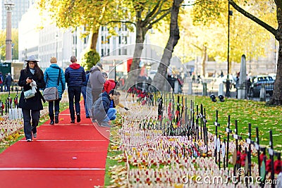 LONDON, UK - NOVEMBER 19, 2017: Poppy crosses at the Westminster Abbey Field of Remembrance, to remember military and civilians wh Editorial Stock Photo