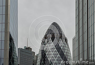 View of The Gherkin building (The swiss re gherkin) or 30 St Mary Axe. One of the famous London landmark. Editorial Stock Photo