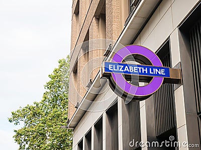 The Elizabeth line underground train station sign logo. Bond St. Editorial Stock Photo