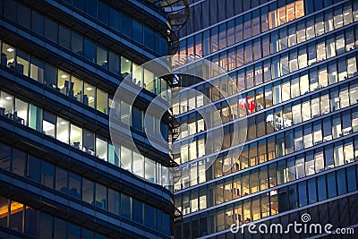 LONDON, UK - 7 SEPTEMBER, 2015: Office building in night light. Canary Wharf night life Editorial Stock Photo