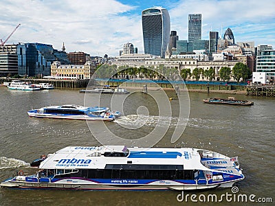 LONDON/UK - SEPTEMBER 12 : River Buses Cruising along the River Editorial Stock Photo