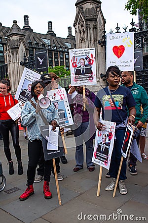 Anti knife crime campaigners from Operation Shutdown protesting outside the gates of Parliament Editorial Stock Photo