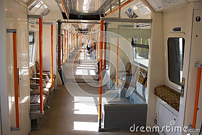 London, United Kingdom. August 22, 2009 - inside vew of empty London underground train no people, day light Editorial Stock Photo