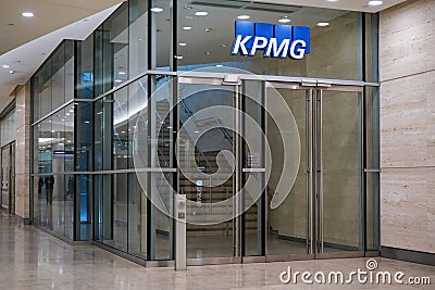 London, United Kingdom - February 03, 2019: Blue KPMG signage at entrance to their offices on 15 Canada Square in Canary Wharf - Editorial Stock Photo