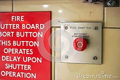 London, United Kingdom - February 02, 2019: Emergency fire shutter button at underground train station wall, with instructions on Editorial Stock Photo