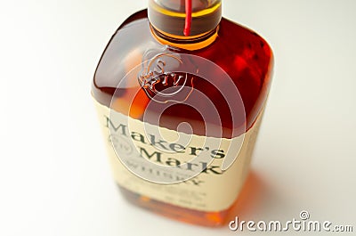 LONDON, UNITED KINGDOM - JULY 24, 2022 Bottle of the Maker`s Mark small batch bourbon whiskey produced in Loretto, Kentucky, by Editorial Stock Photo