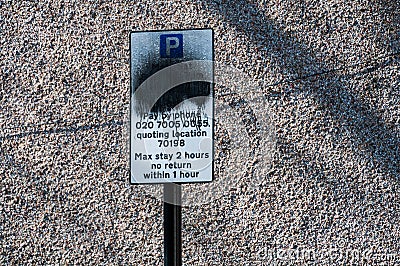 Anti-social behaviour, youths, spray paint parking restriction Editorial Stock Photo