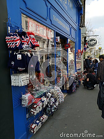 LONDON, UNITED KINGDOM - MARCH 30, 2019 : various souvenir sold at Portobello Market in Notting Hill on March 30, 2019 in London, Editorial Stock Photo
