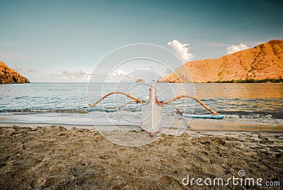 Lone boat at the shore of the beach at Zambales, Philippines Stock Photo