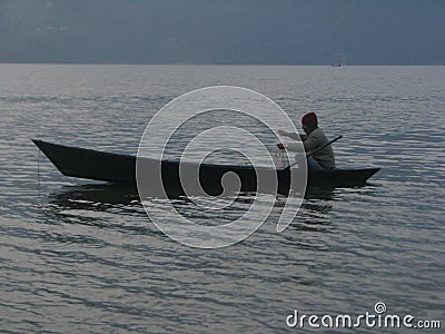 Lone boatsman Editorial Stock Photo