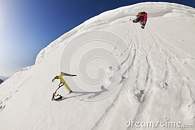 Lone climber living in a snow cave Stock Photo