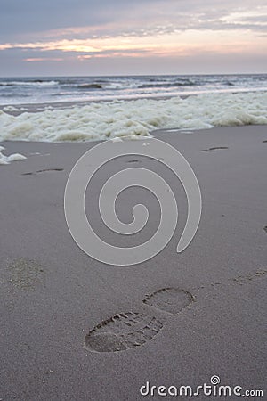 Lone footprint at beach Stock Photo