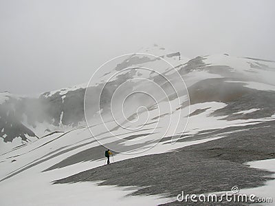 Lone hiker on a winter mountain Stock Photo