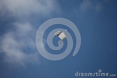 Lone paraglider in the sky Stock Photo