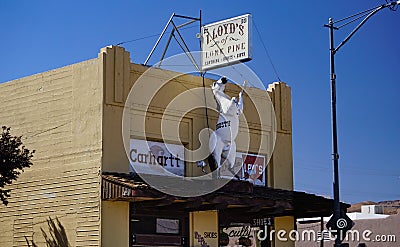 Horse symbol advertises a clothing and western wear store in Lone Pine, California. Editorial Stock Photo