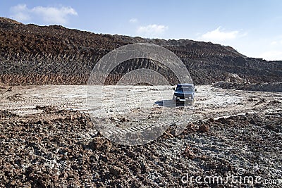 A lone rover in a clay quarry Editorial Stock Photo