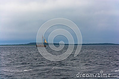 A lone sailboat in Onezhskaya Guba. Stock Photo