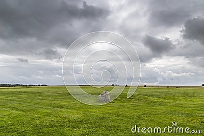 Lone stone at Stonehenge on a cloudy day Stock Photo