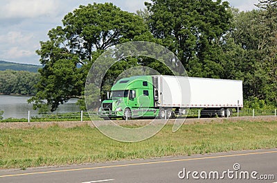 Lone tractor-trailer on an interstate highway. Editorial Stock Photo