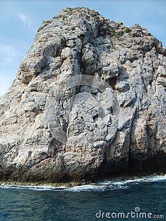 A lone white rock in the sea Stock Photo