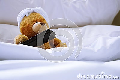 Lonely bear in bed Stock Photo