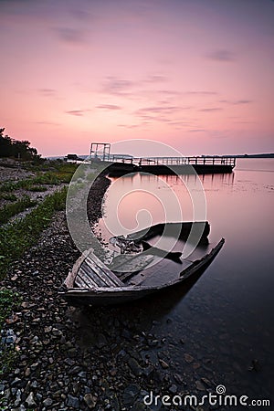 Lonely boat on the bank Stock Photo