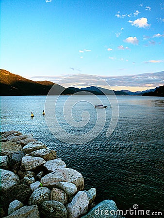 Lonely boat on a lake Stock Photo