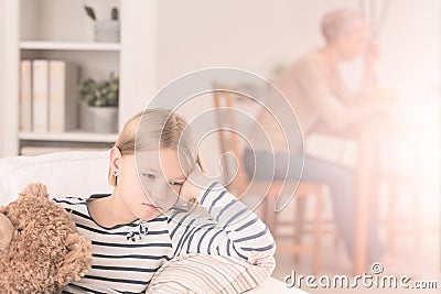 Lonely child and ill mother Stock Photo