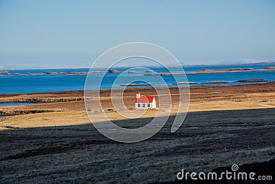 Lonely church in front of the sea in Iceland Stock Photo