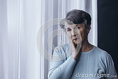 Elderly person suffering from Alzheimer Stock Photo