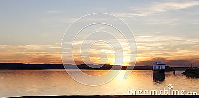 Lonely house and lake Stock Photo