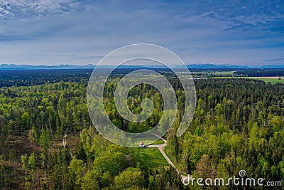 A lonely idyllic house in the middle of a green forest in spring, bavaria, germany. Stock Photo