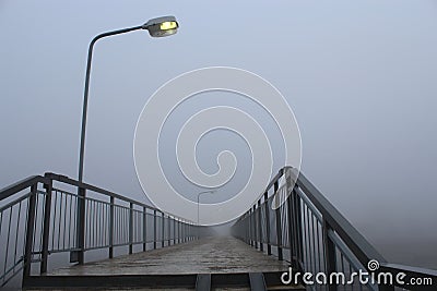 and stairs in the fog pedestrian bridge Stock Photo