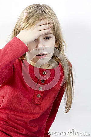 Lonely little girl hold her head Stock Photo