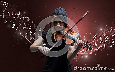 Lonely composer playing on violin Stock Photo