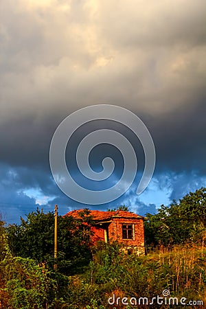 Lonely old house on the hill Stock Photo