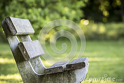 A lonely park bench Stock Photo