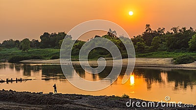 Lonely people watching the sunset Stock Photo