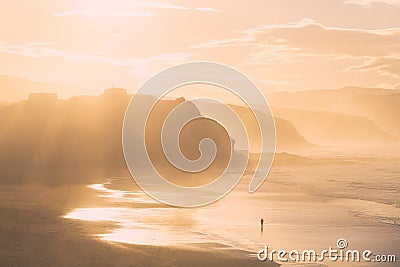 Lonely person alone in beach Stock Photo